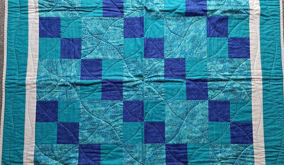 Blue and turquoise quilt