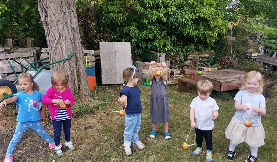 Children at a family growing activity