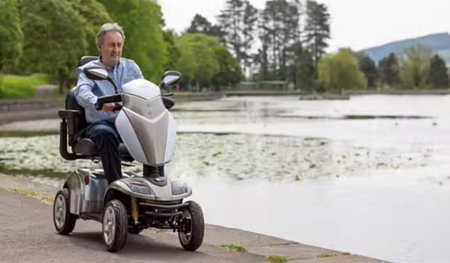 elderly person on scooter