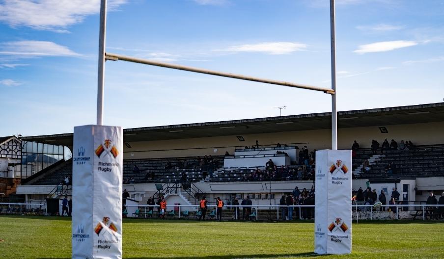 A pitch side image of Richmond Athletic Ground