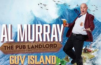 Poster for Al Murray the pub landlord: Guv Island. Al surfs on a breaking wave, using the British Isles as a surfboard.