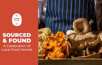Person holding a wooden crate with assorted mushrooms, including chanterelles and oyster mushrooms, next to a text promoting local food celebration by