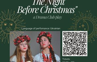 Two actresses-teenagers in Ukrainian folk costumes are on stage, playing