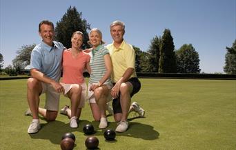 People playing bowls