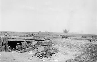 Troops observing shell burst