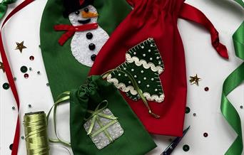 Three decorated gift bags