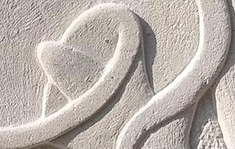 Botanical stone carving