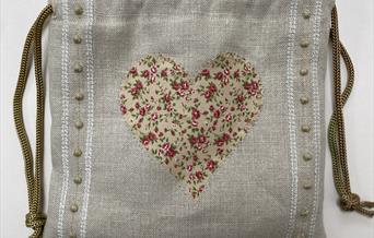 Appliqued drawstring bag