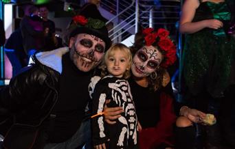 Family in Halloween fancy dress