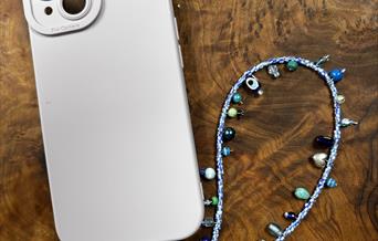 Phone case with charm