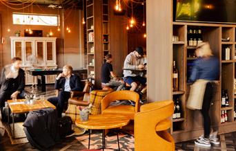 People sitting at The Crane Tap for post-work drinks