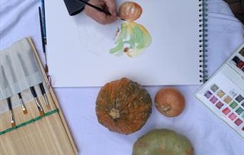 Painting pumpkins and gourds