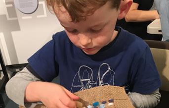 Child doing craft activity