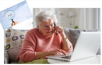 An older lady looking at a laptop