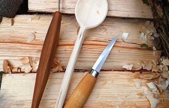 Carved spoon and tools