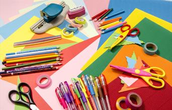 craft tools on a rainbow background