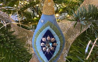 Embroidered decoration on a tree
