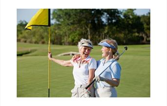 Two ladies enjoying golf