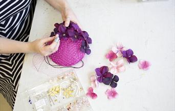 Hat being made