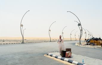 Sudanese hitchhiker on the road to Riyadh