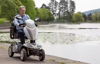 elderly person on scooter