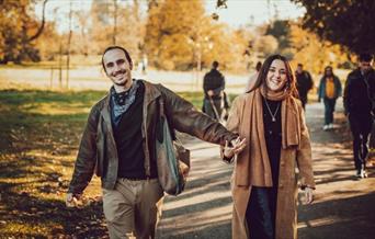 Couple walking in Richmond Park