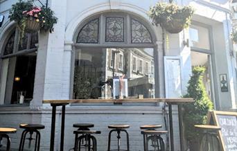 the railway exterior, table, chairs