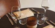 Mignonette Restaurant Table with Glasses and Cutlery