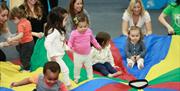 My Gym Children Playing On Parasol