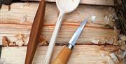 Carved spoon and tools