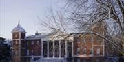 East front of Osterley Park, Middlesex, with snow covering the ground and a tree in the foreground