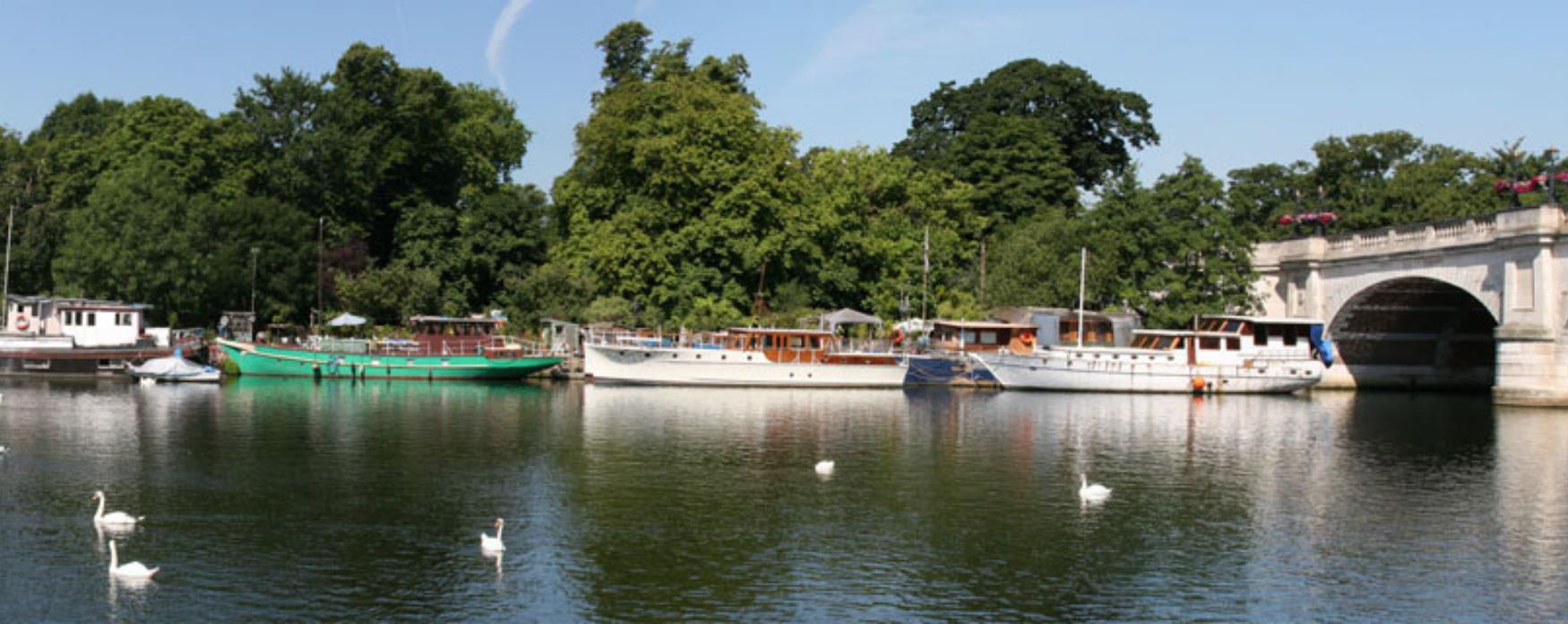 A picture of boats lined up in River Thames