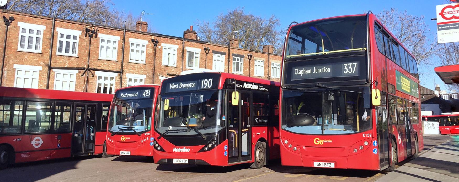 A picture of 4 buses at Richmond station
