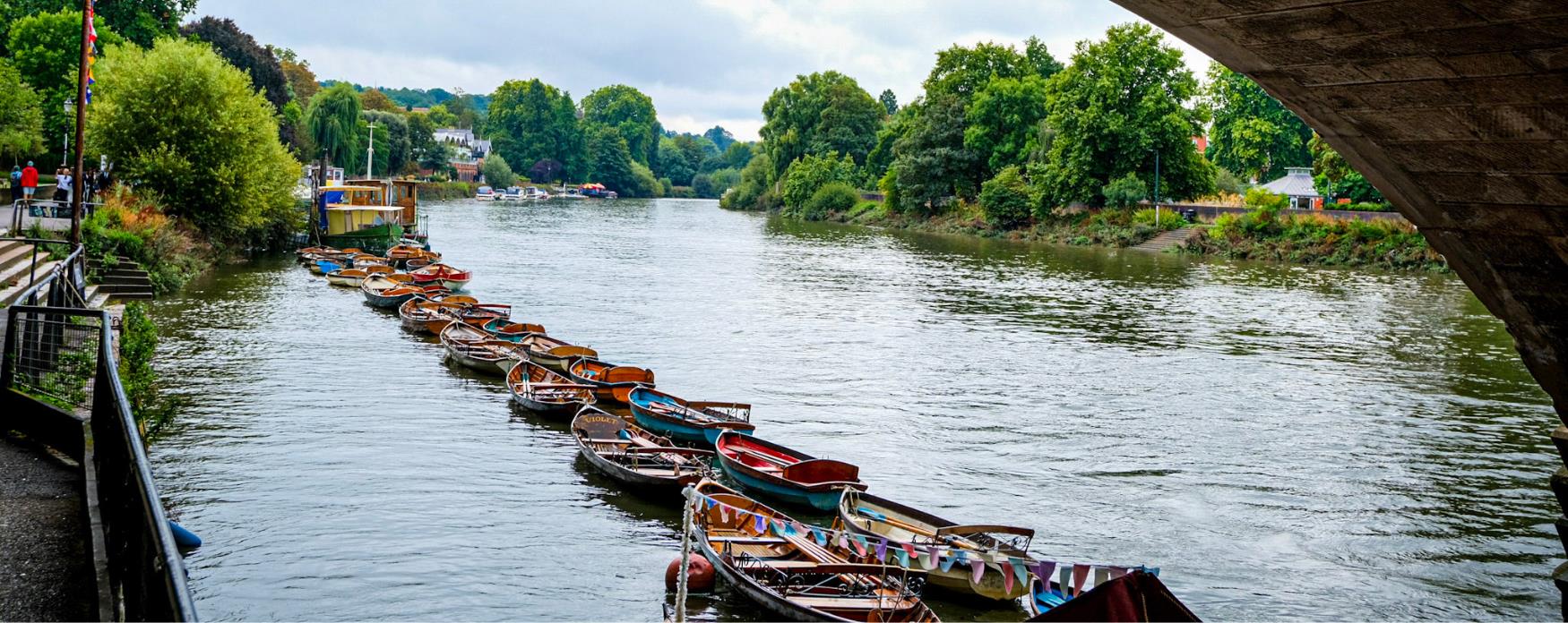 An image of Richmond riverside with boats lined up