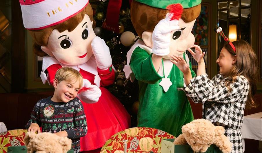 Two children having festive fun. Two children having festive fun.