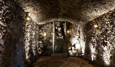 A front shot of Pope's grotto inside historic place