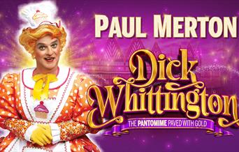 Poster for Dick Whittington; Paul Merton is dressed as the Panto Dame, Sarah the Cook, against a purple-tinted town background. The title reads, "Dick