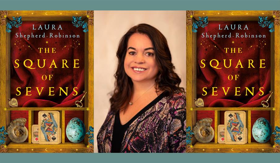 Photo of author with images of her book 'The Square of Sevens' on either side of her.