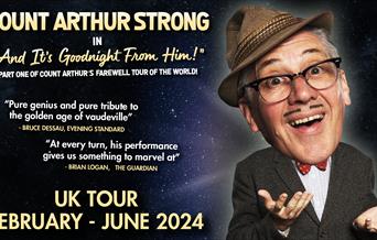 Poster for Count Arthur Strong. Count Arthur Strong is pictured against a starry background. His head has been edited to be cartoonishly bigger than h