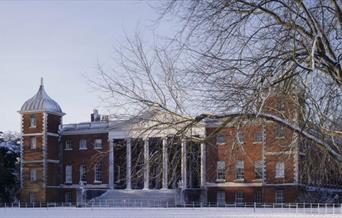 East front of Osterley Park, Middlesex, with snow covering the ground and a tree in the foreground