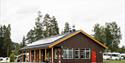 new service building with toilets and showers that are also adapted for guests with disabilities