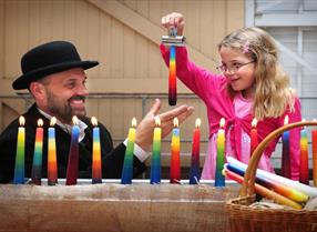 Child and entertainer enjoying a game