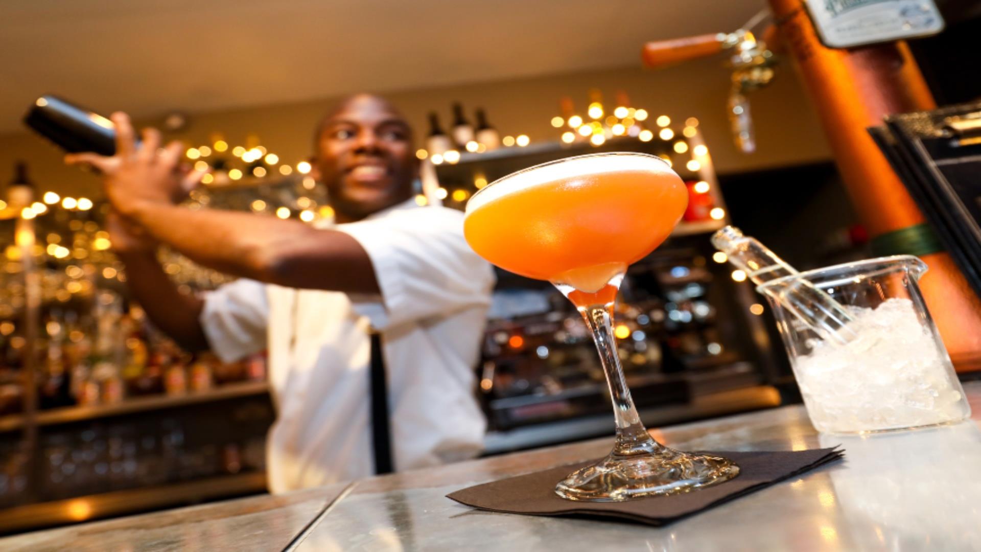 bartender making a cocktail at The Liquor Lab