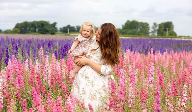 Mother and child stood in Shropshire Flower Field