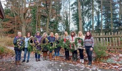 Group stood with their Wreaths