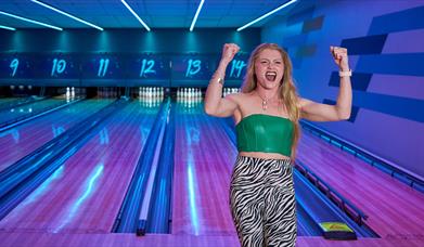 Lady at a bowling alley