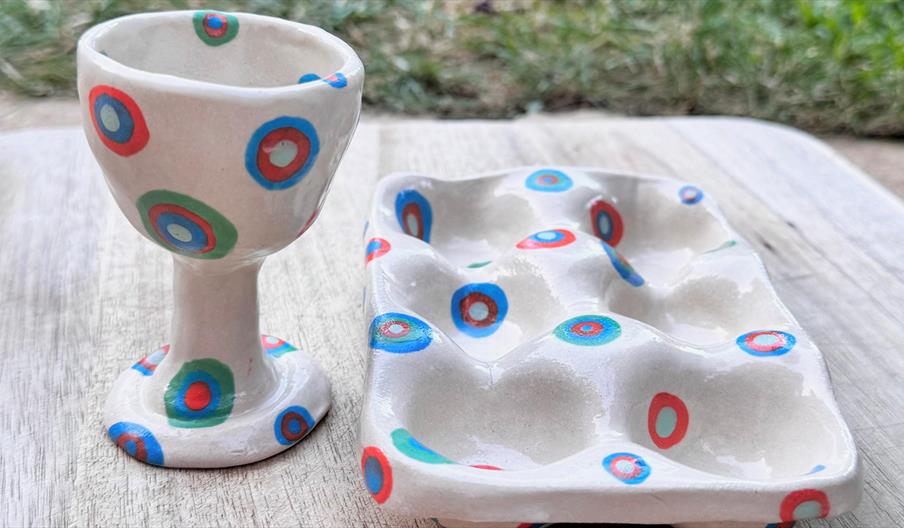 Hand-buillt and decorated Egg Cup and Egg holder