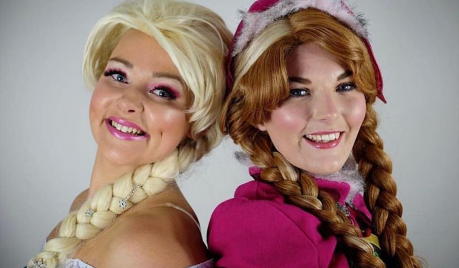 Ladies dressed up as Disney princess charactors