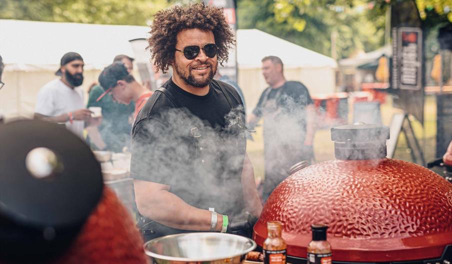 Adam Purnell pictured cooking over fire