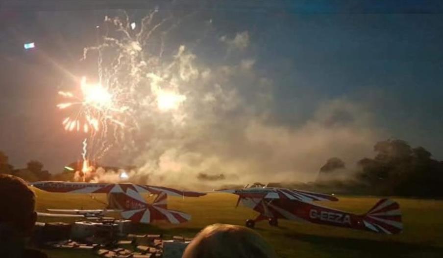 Ticket holders enjoying the display in the night sky